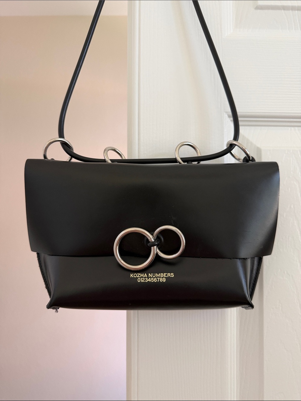 Kozha Numbers Leather Shoulder Bag